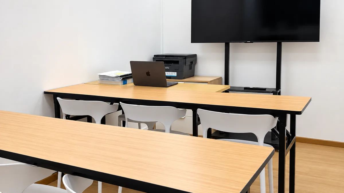 WhaleYou Learning classroom set up with six desks, the maximum class size
